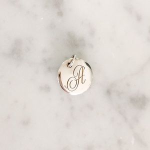 Tiffany & Co. Tiffany Notes Letter “A” Disc Charm